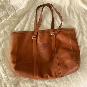 Vintage Eddie Bauer leather interior tote in cognac. Well loved, but looks great